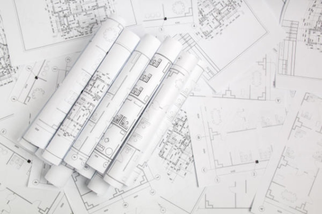 blueprints representing comprehensive plan.